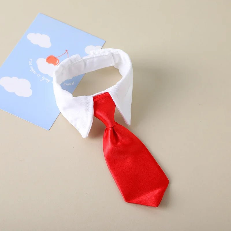 Collier de chat réglable avec nœud papillon rayé, idéal pour son toilettage - L Univers Des Felins